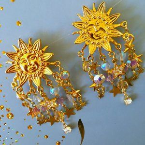Bedazzling Kirks Folly Rhinestone Sun and Star Dangle Clip On Earrings - Signed